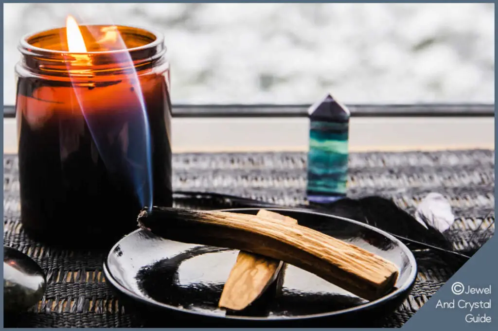 Photo of fluorite being cleansed with fire and wind