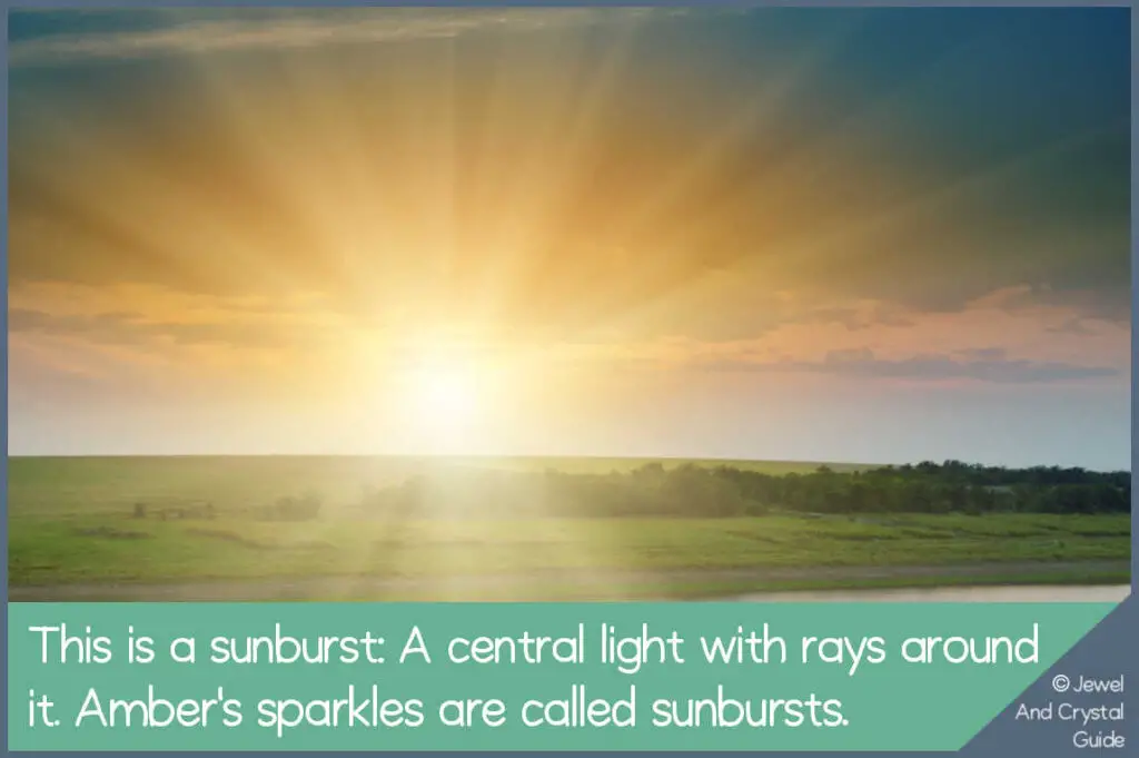 Photo of the sun showing a sunburst showing what amber's sparkles look like