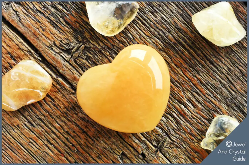 Photo of calcite heart and crystals for those who should wear them